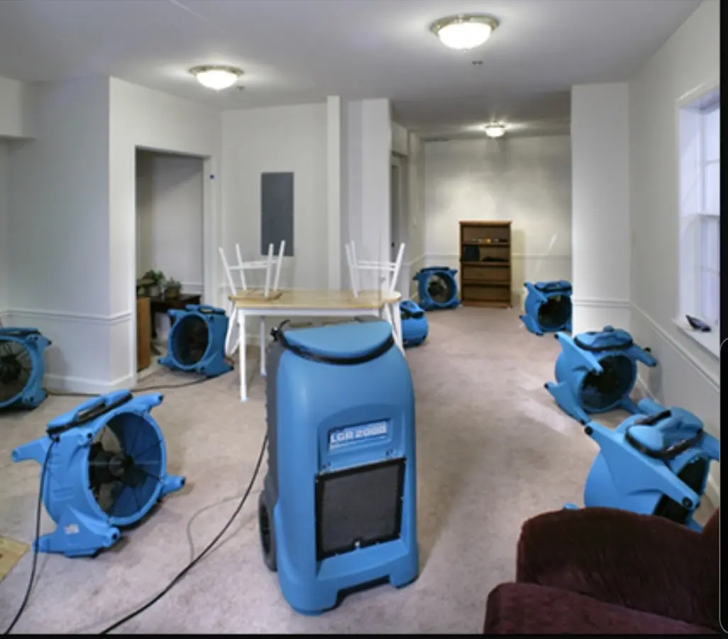 Air movers and dehumidifier setup for Water Damage Restoration in Sunbury